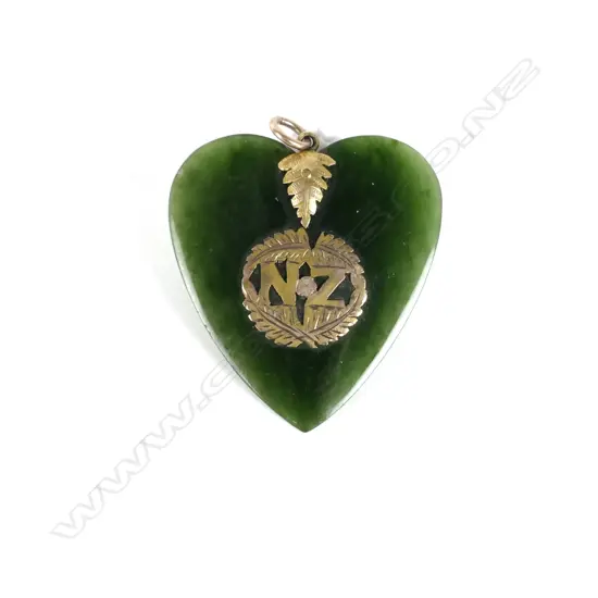 A colonial 9ct. gold and pounamu heart pendant