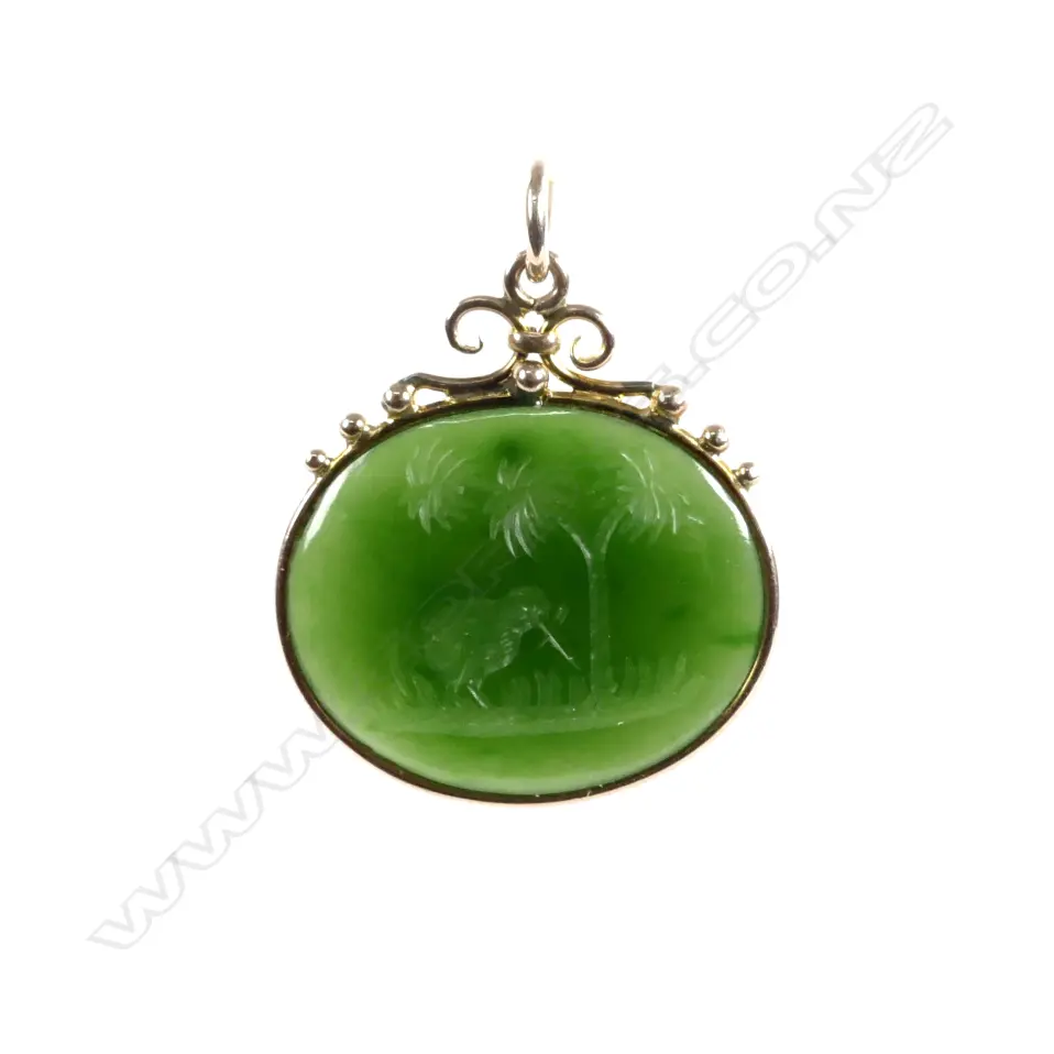 A colonial 9ct. rose gold frame pounamu pendant Image 1++