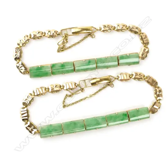 A pair of 14ct. gold and jade bracelets