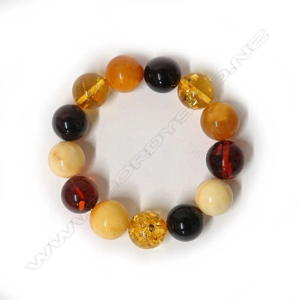 A various amber bead bracelet Image 1++