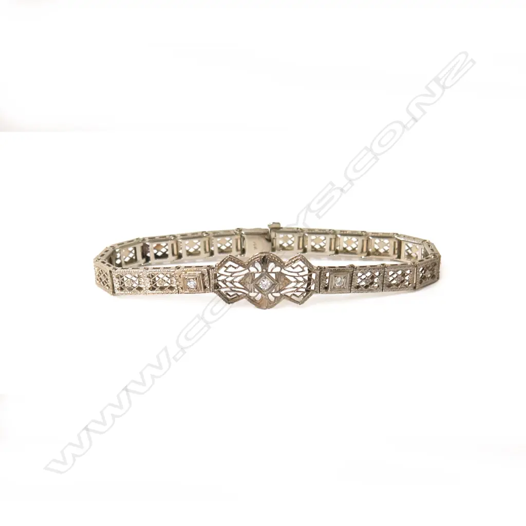A vintage Art Deco style 14ct. white gold and diamond bracelet. 10.43gms Image 1++