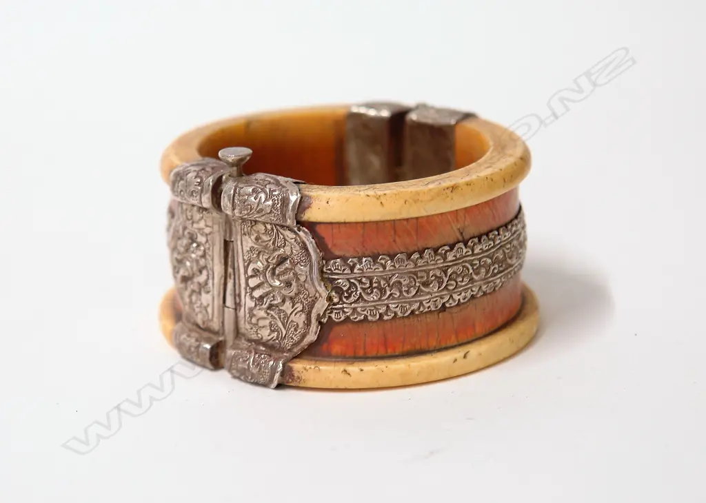 An old Indian ivory and silver hinged bangle Image 1++