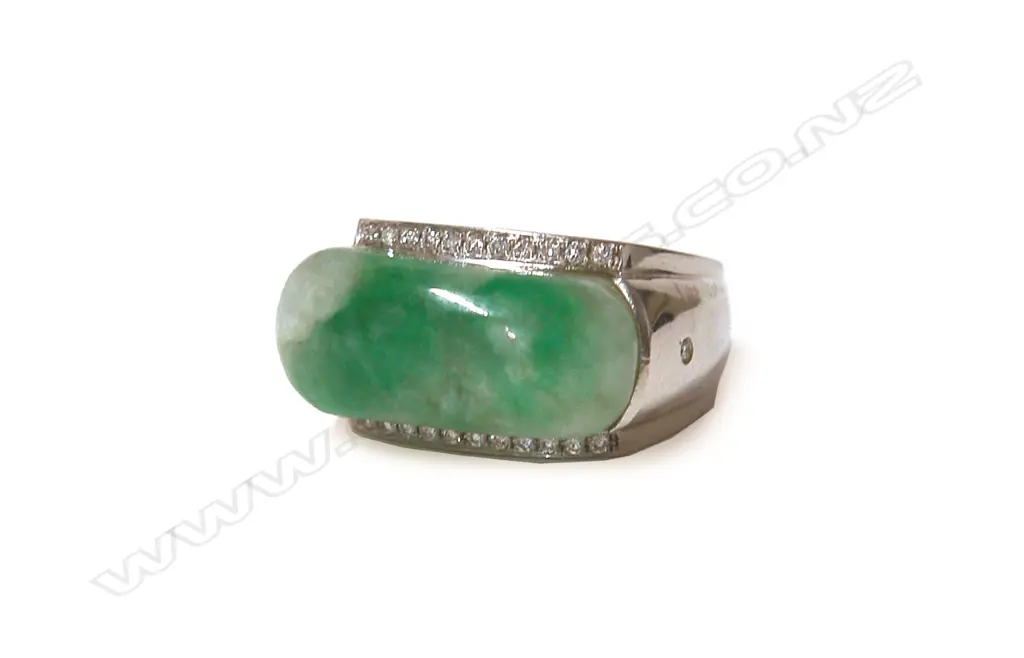 A modern large 18ct. white gold jadeite and diamond dress ring Image 1++