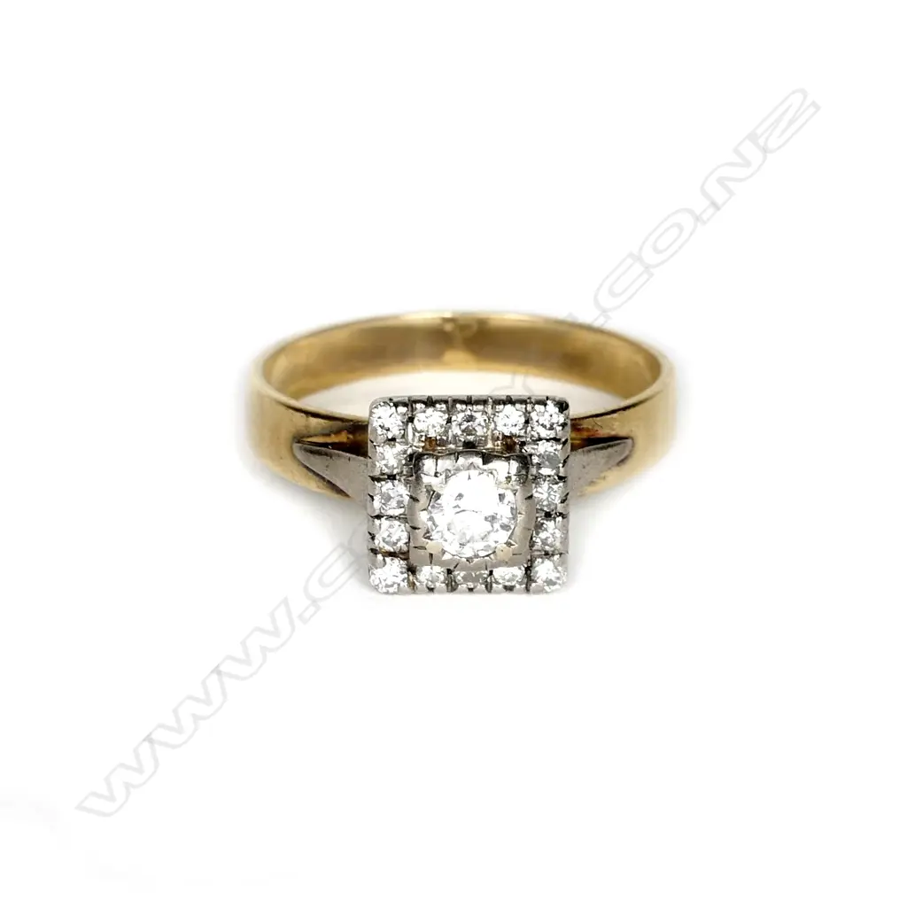 An 18ct. gold and diamond cluster ring Image 1++