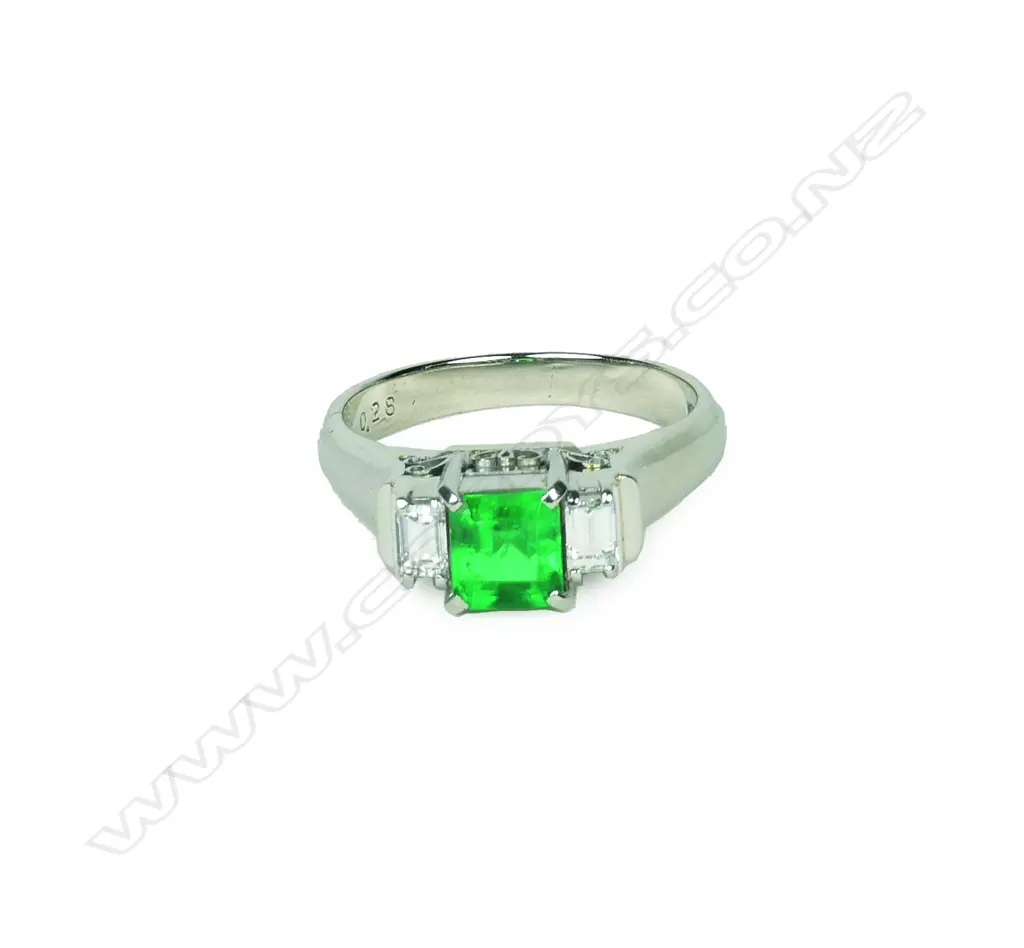 A platinum emerald and diamond ring Image 1++