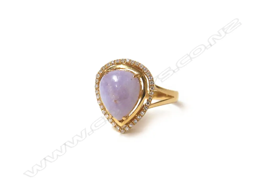 An 18ct. yellow gold purple jade and diamond lady's dress ring Image 1++