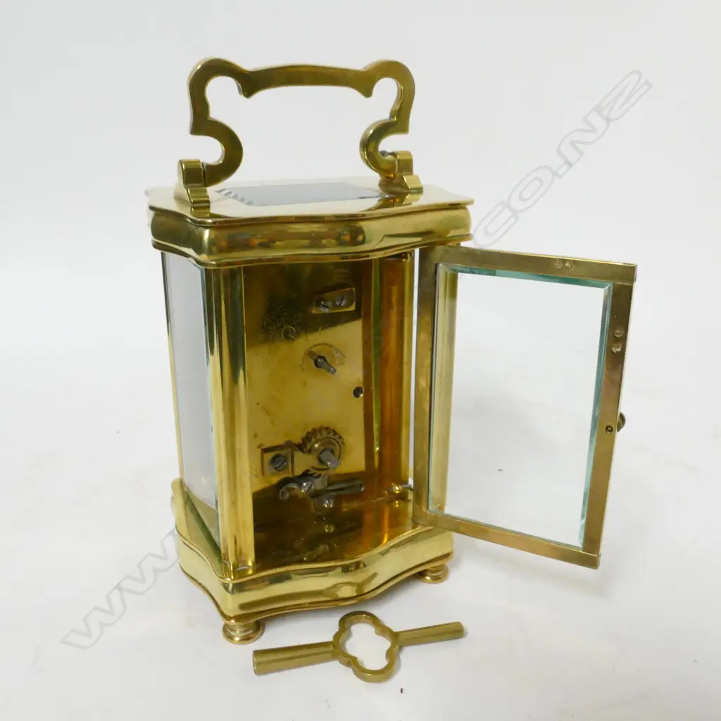 A French brass serpentine corniche cased carriage clock Image 1++