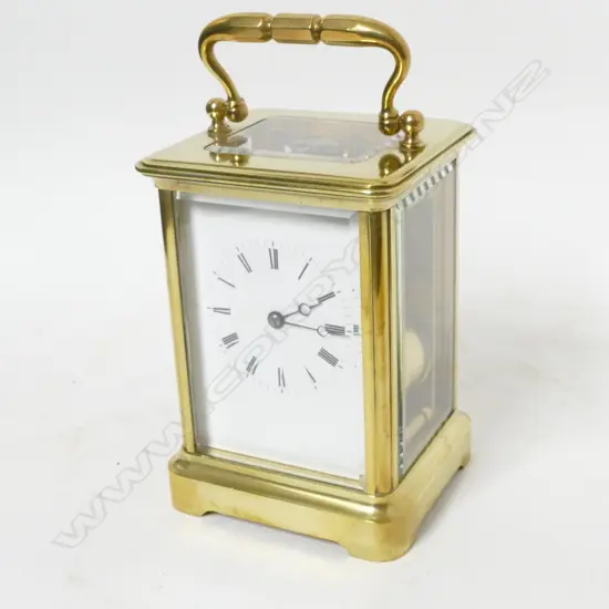 A French brass corniche cased carriage clock