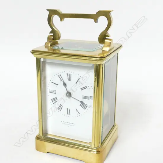 A French brass corniche cased carriage clock by Richard & Cie. Paris