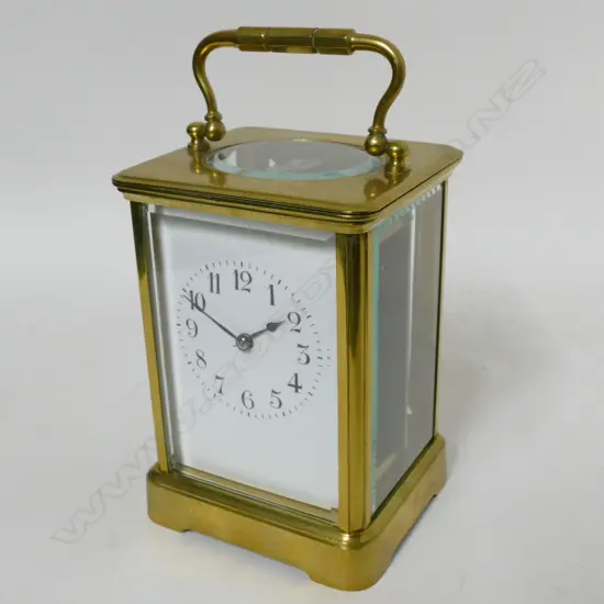 A French brass corniche cased carriage clock by E.G. Lamaille. Paris