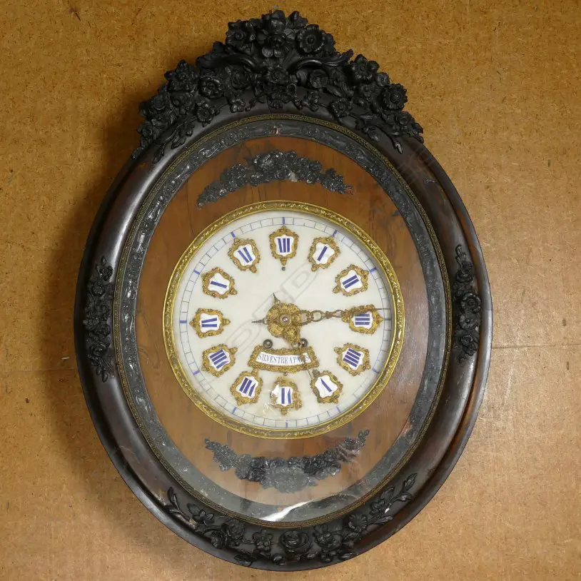 A large 19thC French wood cased oval wall clock Image 1++