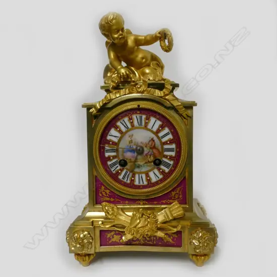 A French 19thC ormolu and polished bronze cased mantel clock