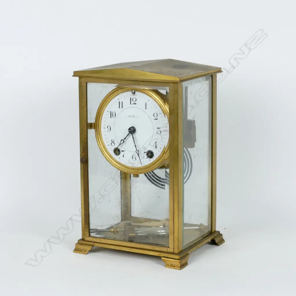A Seth Thomas four-glass mantel clock with a white enamel dial Image 1++