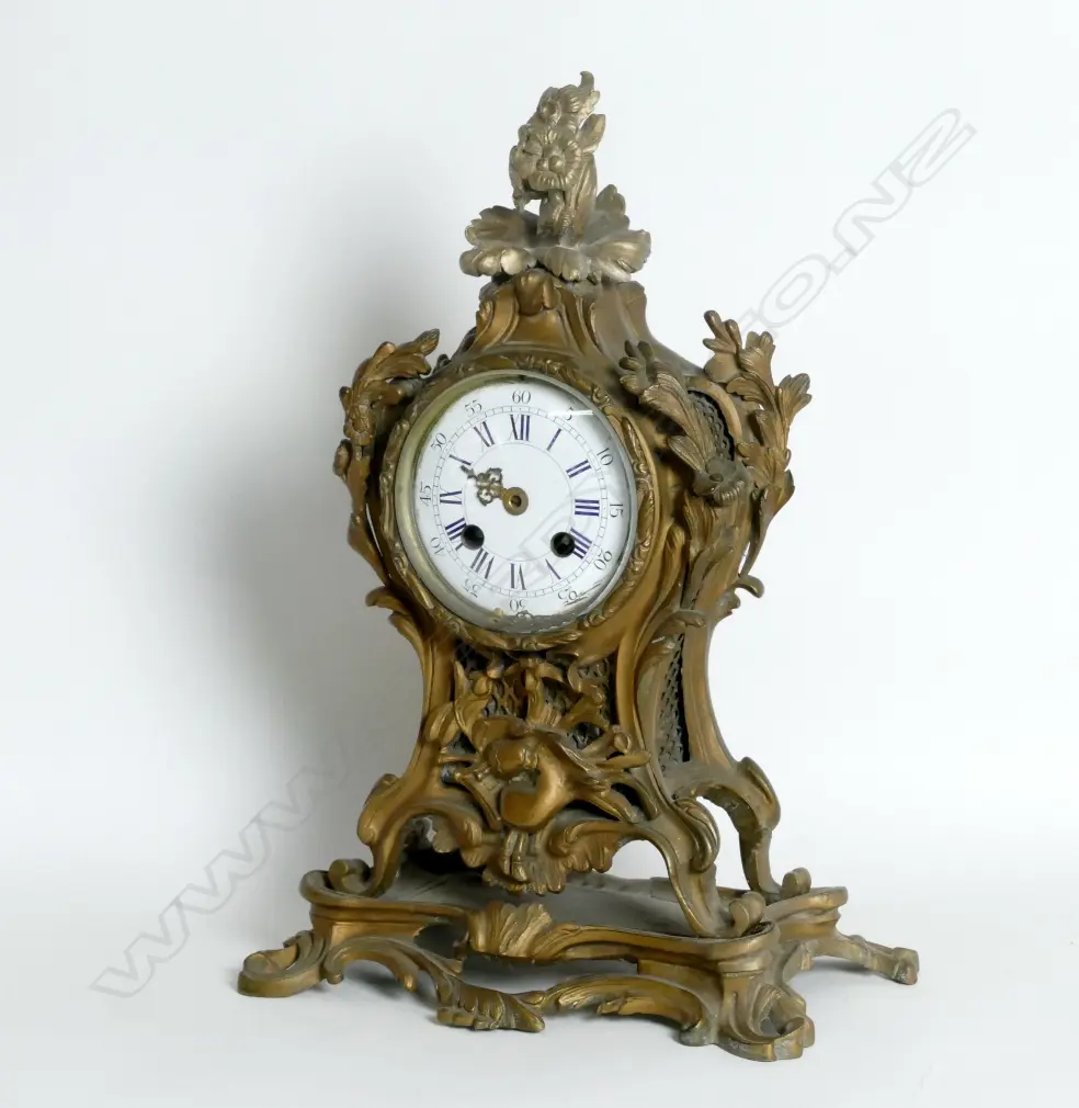 A French ormolu rococo cased mantel clock Image 1++