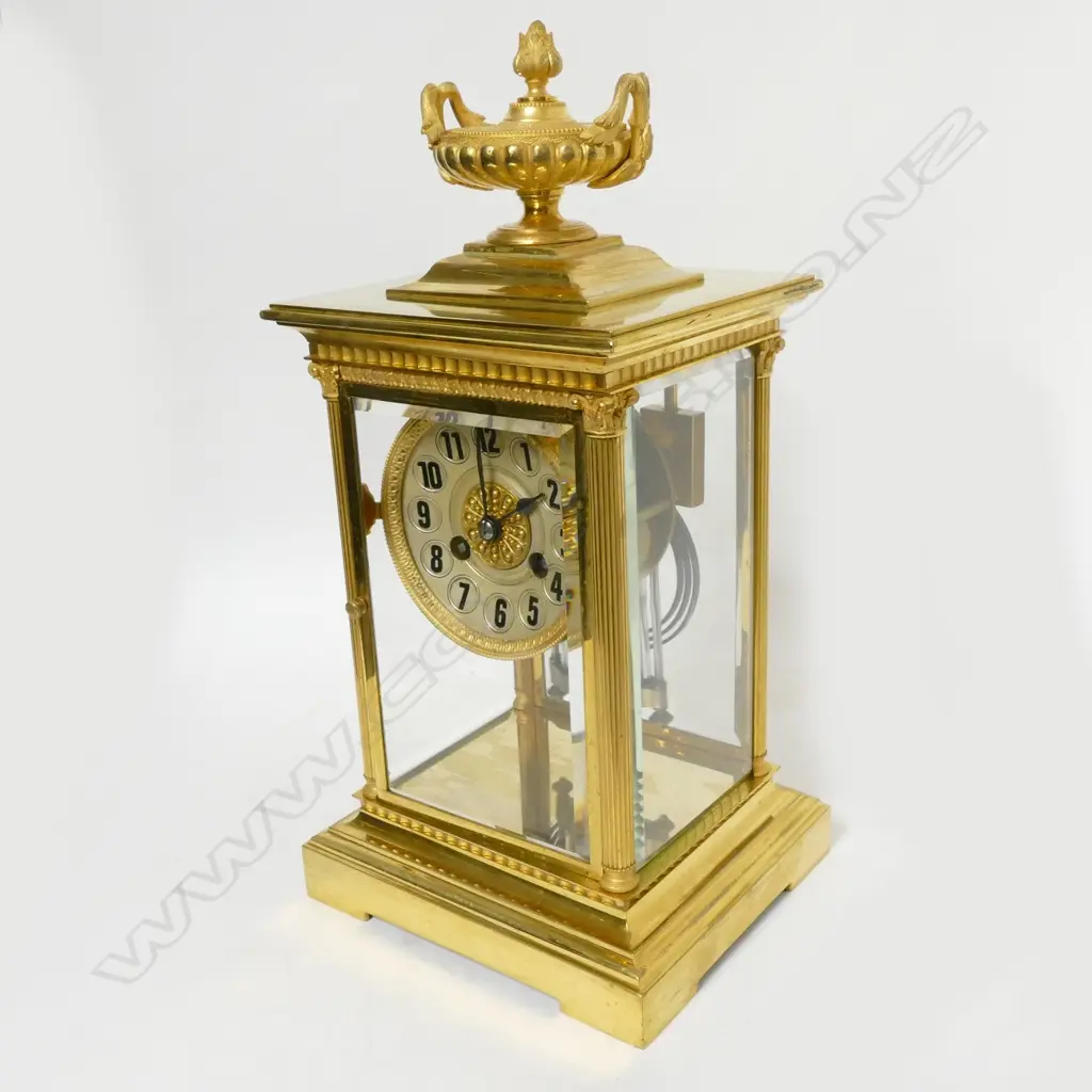 A French brass four glass two train mantel clock Image 1++