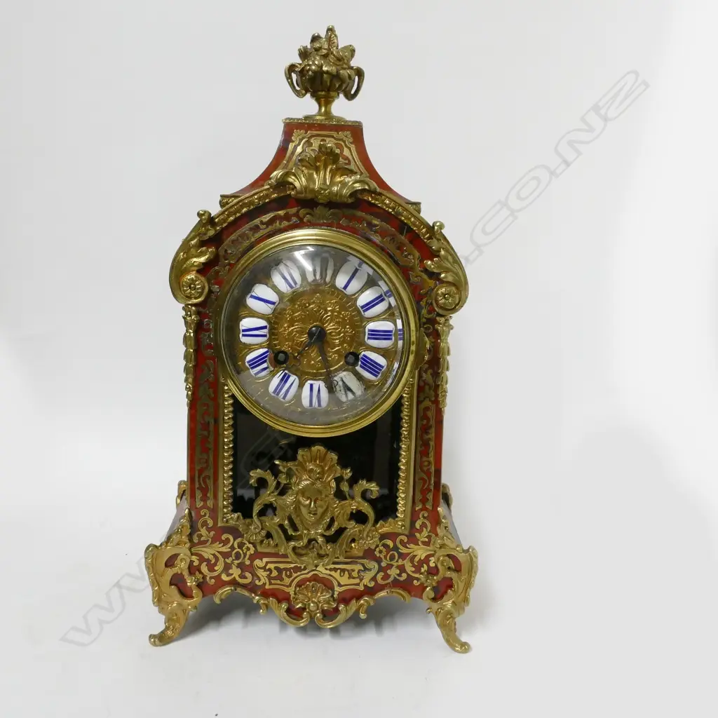 A French red tortoiseshell Boulle cased mantel clock Image 1++