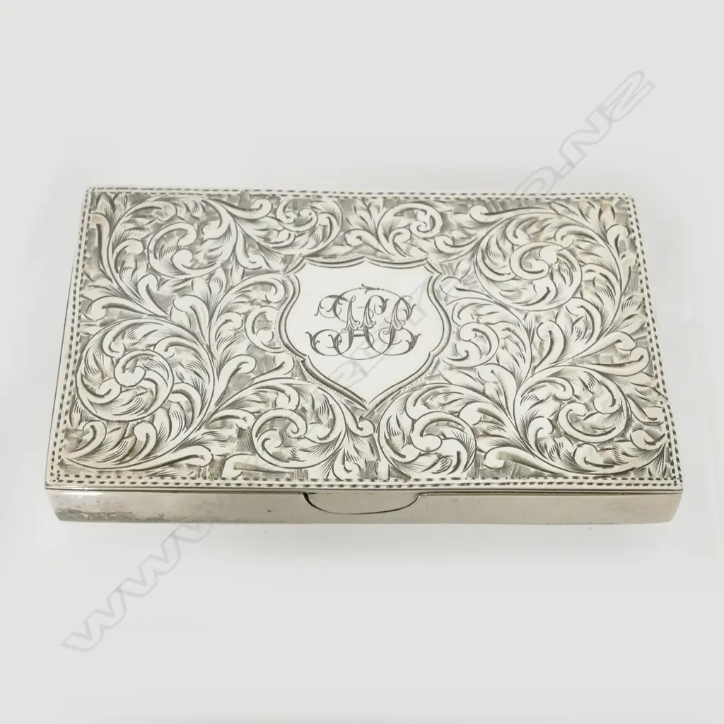 An Edwardian silver card and stamp case Image 1++