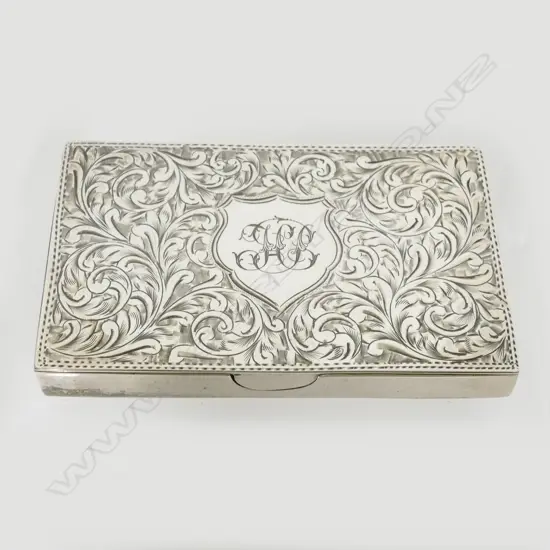 An Edwardian silver card and stamp case
