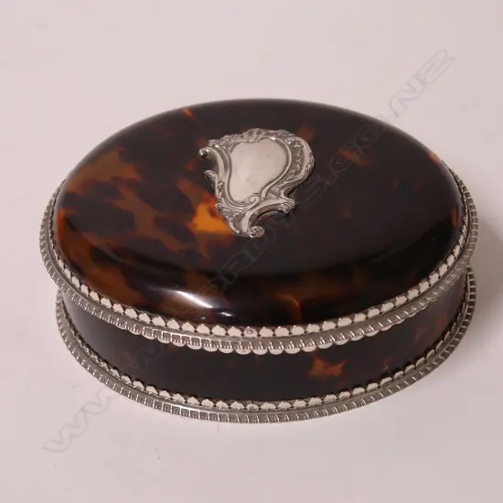 A Victorian silver and tortoise shell oval vanity box