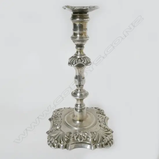 A George II silver taperstick by John Cafe