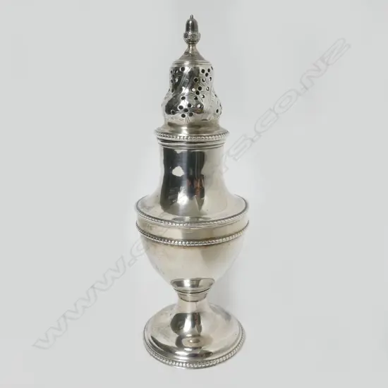 A George III silver vase shaped caster