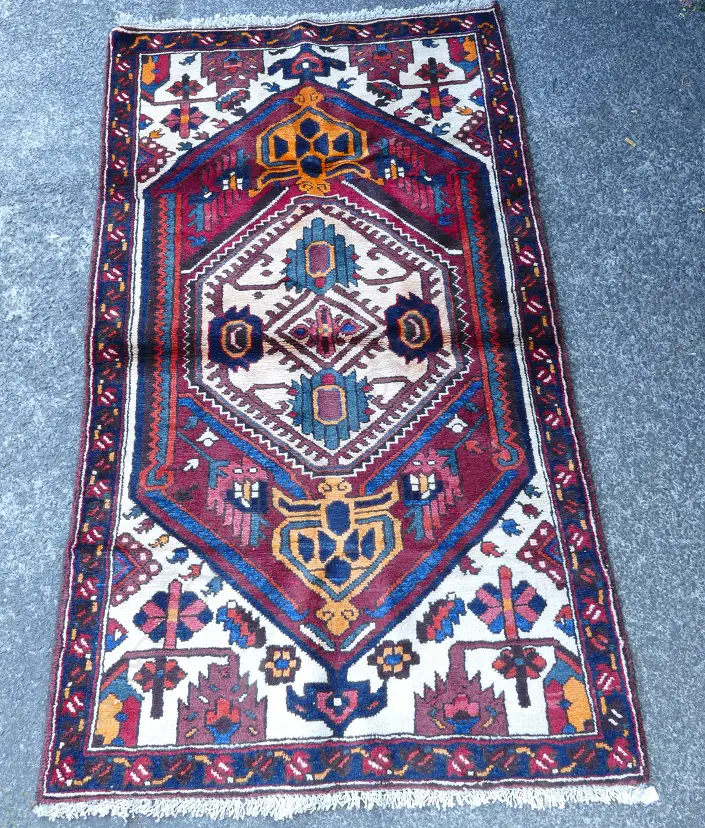 A Persian hand knotted rug Image 1++