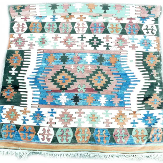 A large wide kilim rug