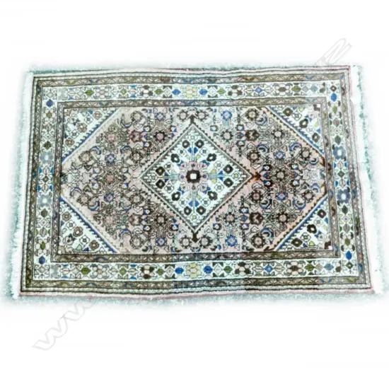 A small hand knotted Persian Hamadan rug