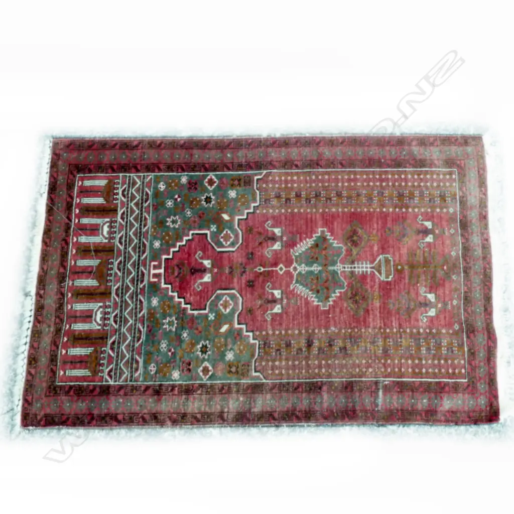 A small hand knotted Turkoman prayer rug Image 1++