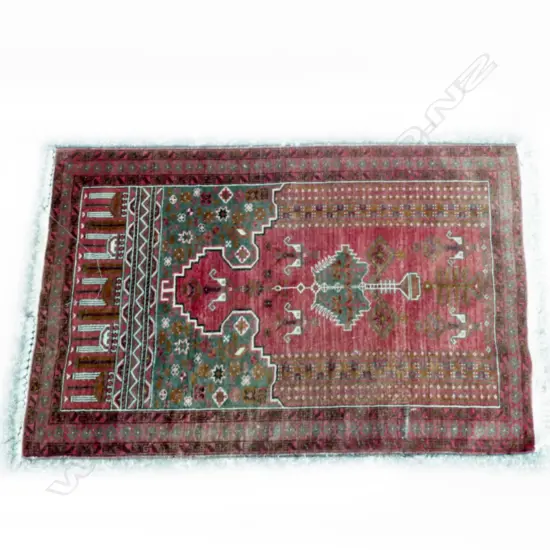 A small hand knotted Turkoman prayer rug