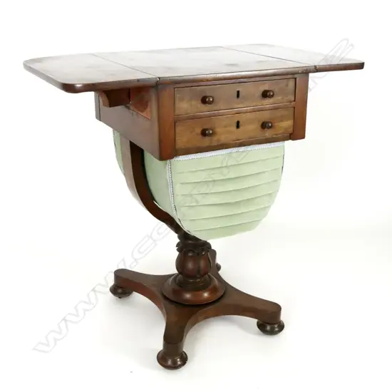 A William IV flame mahogany pedestal base sewing cabinet