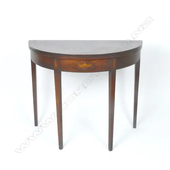 A George III demi-lune fold-over supper table