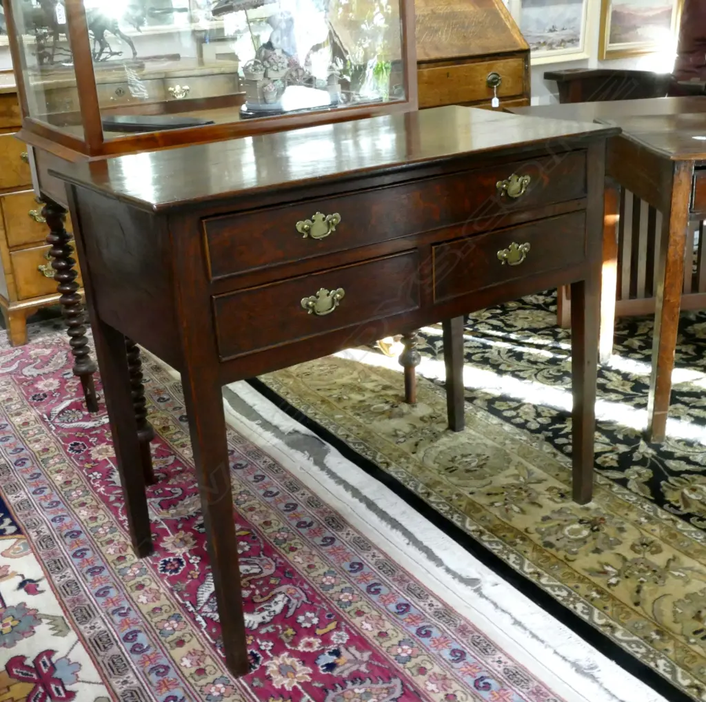 A Georgian oak country lowboy Image 1++