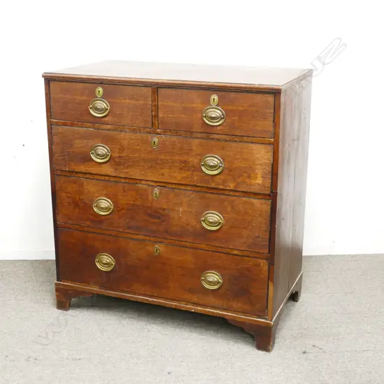 A Victorian oak flat-fronted chest