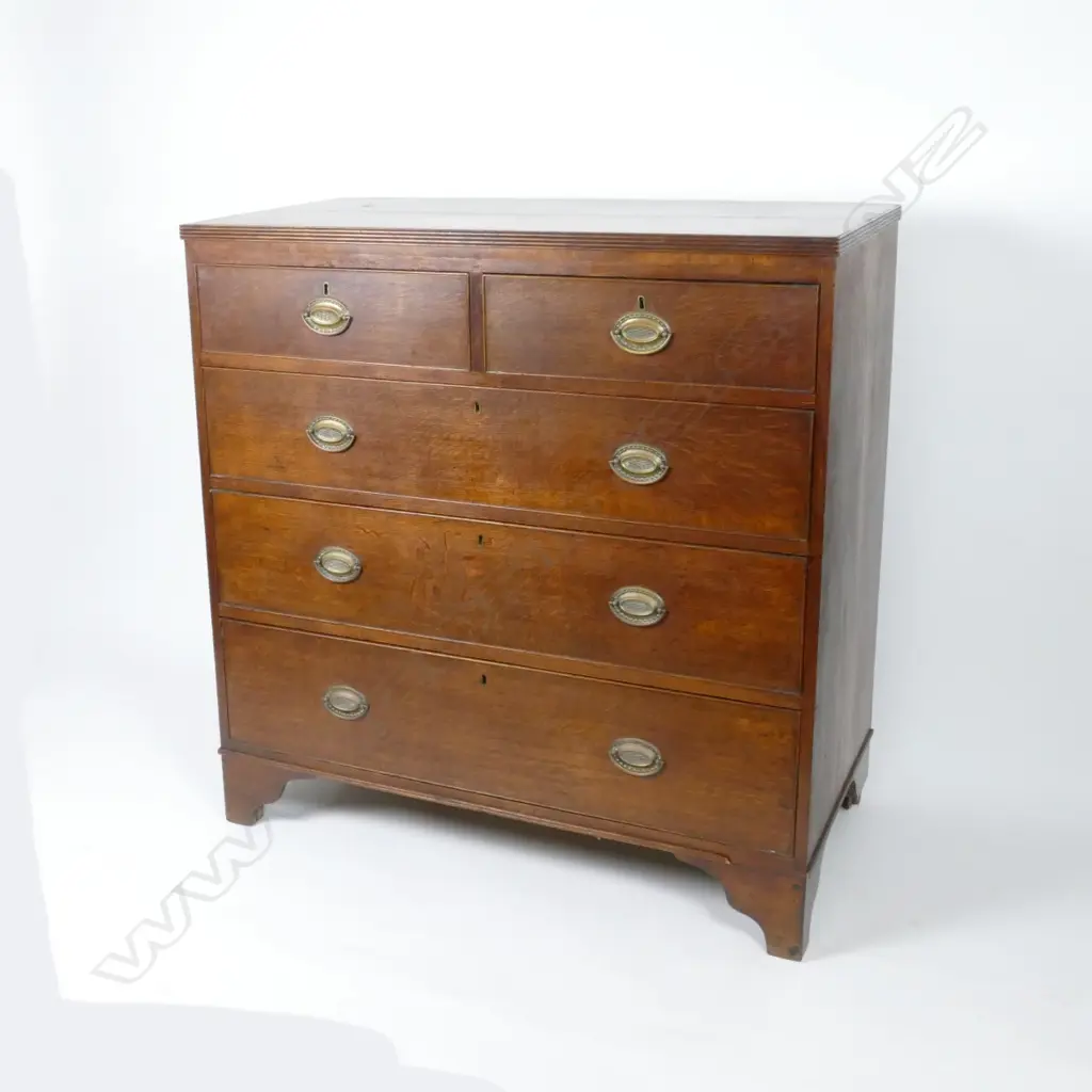 A Georgian oak flat-front chest of drawers Image 1++