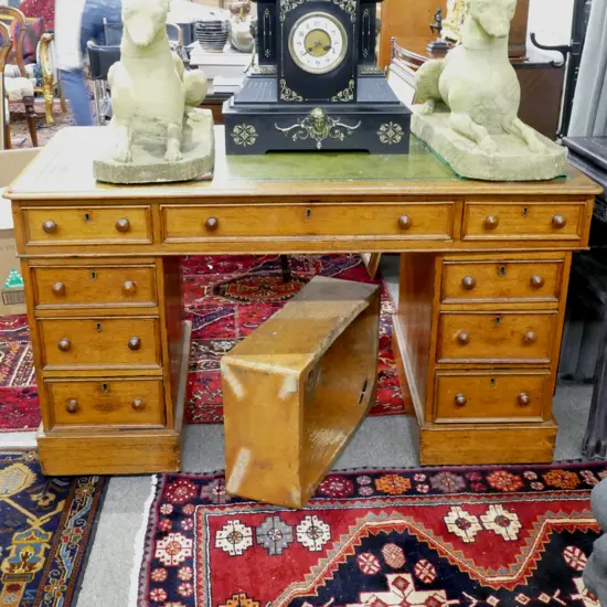 A Victorian oak double pedestal desk