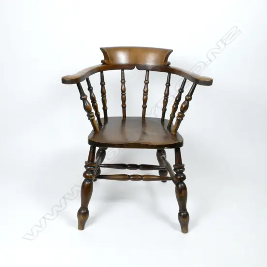 A 19thC oak bow back Captain's desk chair