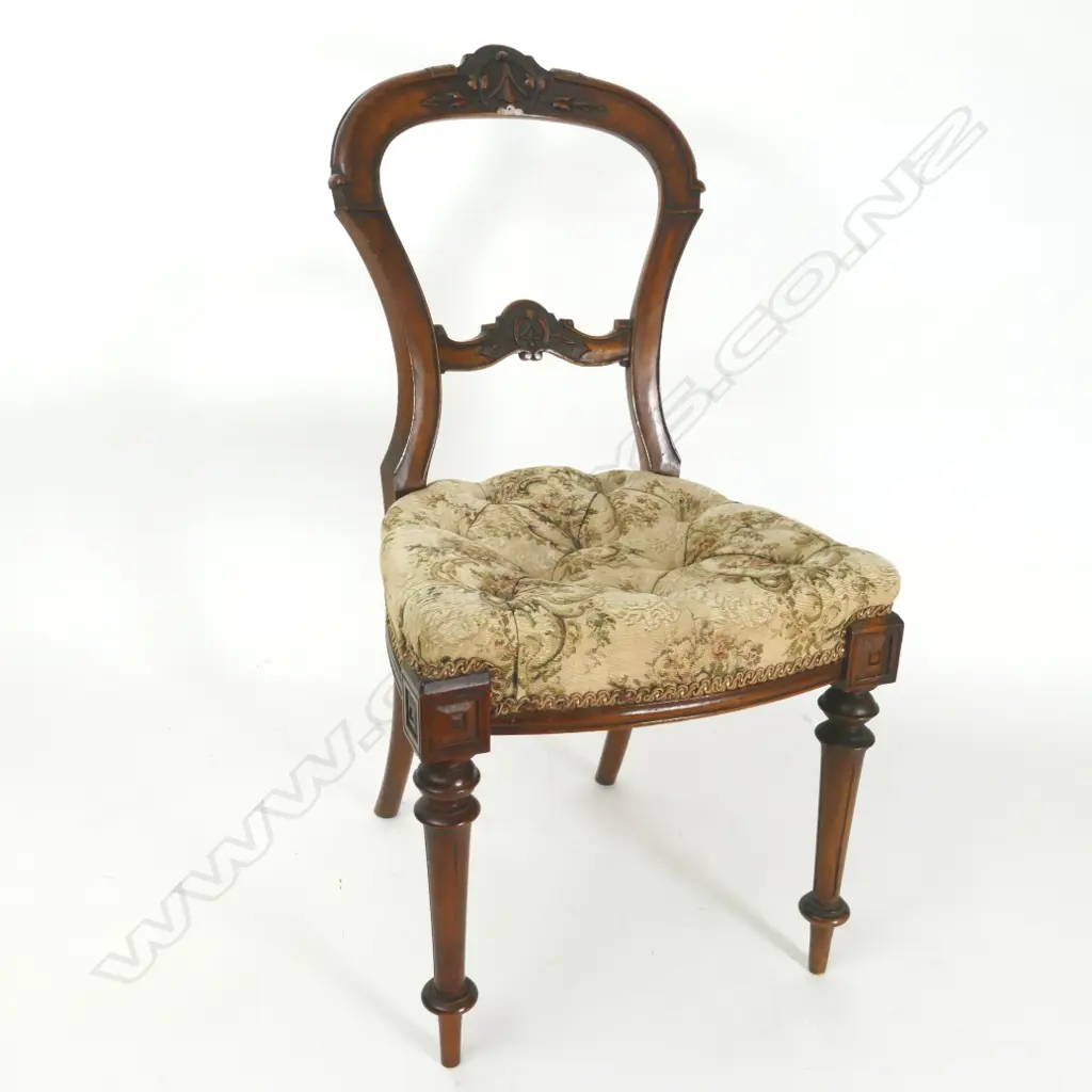A set of five Victorian carved walnut balloon back chairs Image 1++