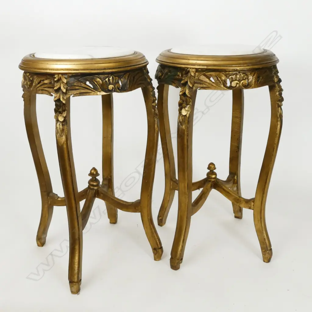 A pair of carved giltwood plant stands Image 1++