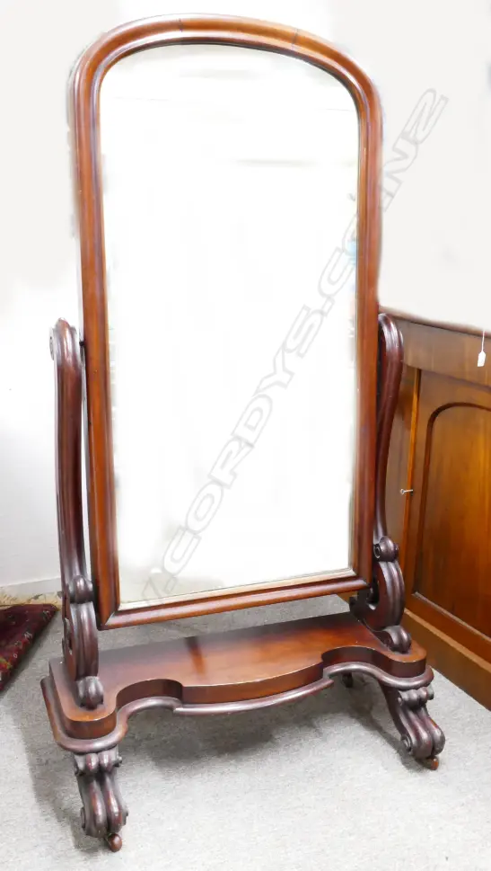 A Victorian mahogany cheval mirror Image 1++