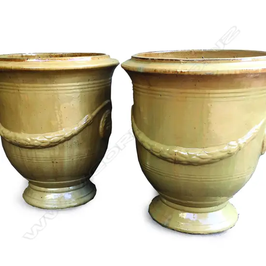 A pair of large antique French style pottery garden urns