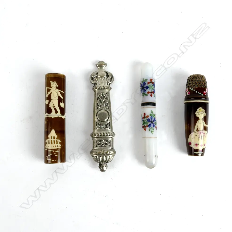 Four old needle cases Image 1++