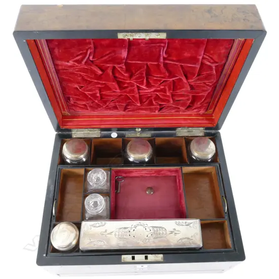 A Victorian walnut dressing case
