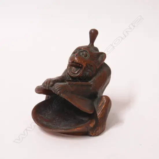 An bronzed spelter novelty monkey vesta