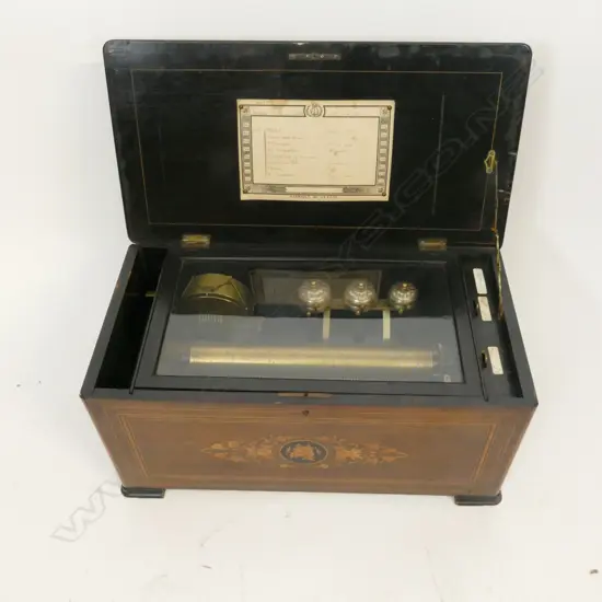 A Swiss walnut cased orchestra music box