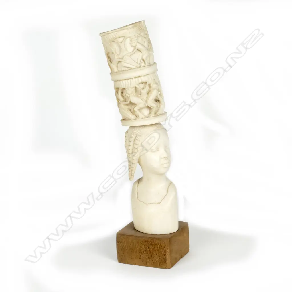 An African ivory bust of a young girl Image 1++