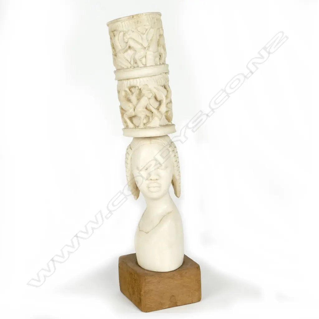 An African ivory bust of a young girl Image 1++