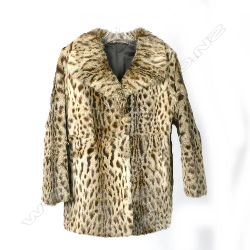An ocelot fur jacket Image 1++