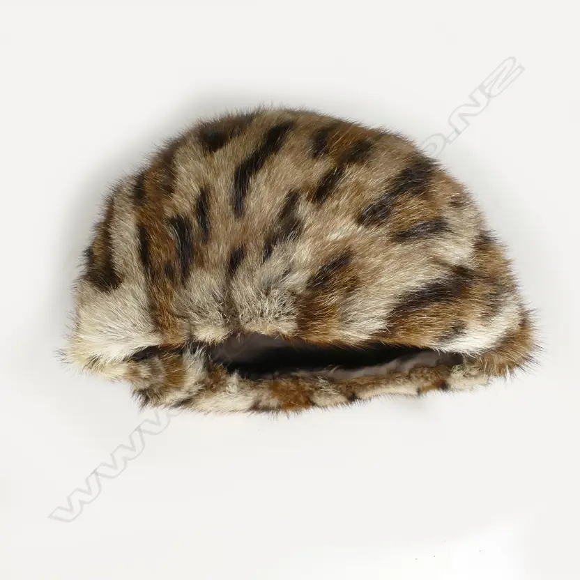 An ocelot fur jacket Image 1++