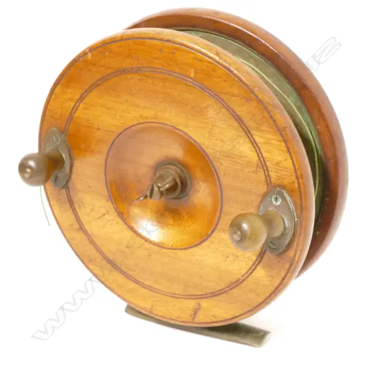 A Farlow's 'Sun' 7" walnut big game sea fishing reel